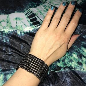 Black beaded bracelet. Heavy and sparkles up close